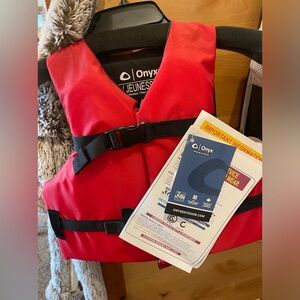 Brand new life jacket for youth 70lbs